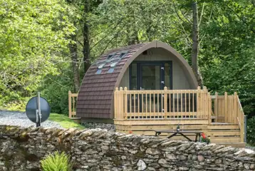 Deluxe glamping pod with a decking and picnic bench Deluxe glamping pod with a decking and picnic bench