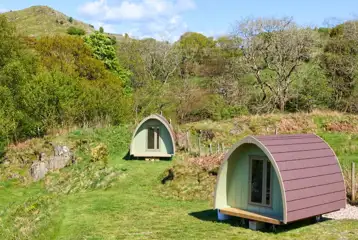 Couples camping pods in the Fellside area at the top end of the camping field Couples camping pods in the Fellside area at the top end of the camping field
