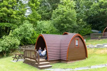 Family Vista camping pod with a deck area and picnic bench Family Vista camping pod with a deck area and picnic bench