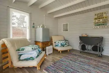 Beach hut cabin living area Beach hut cabin living area