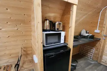 Lakeside ensuite pod with a kitchenette, microwave, toaster, and more Lakeside ensuite pod with a kitchenette, microwave, toaster, and more