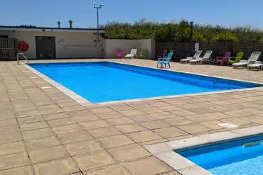 Outdoor swimming pool, unheated and open from July to mid September 10am to 5pm