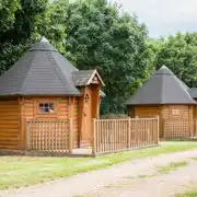 Camping cabins exterior with private decking (four persons) Camping cabins exterior with private decking (four persons)