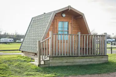 Cocoon camping pod exterior with decking