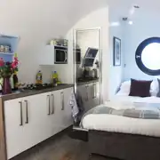 Ensuite glamping pod double bed and kitchenette Ensuite glamping pod double bed and kitchenette