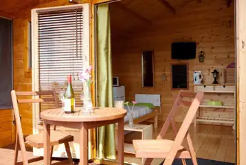 Camping cabin outdoor seating area Camping cabin outdoor seating area