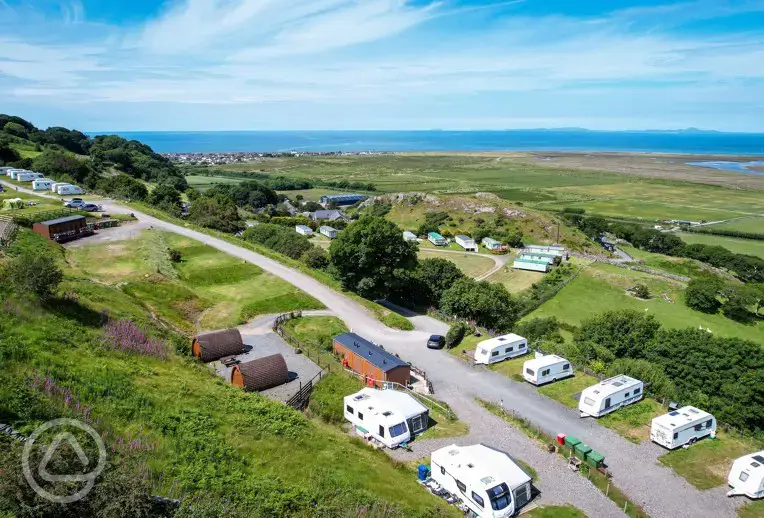 Hardstanding pitches beside Mawddach View and Mountain View camping pod