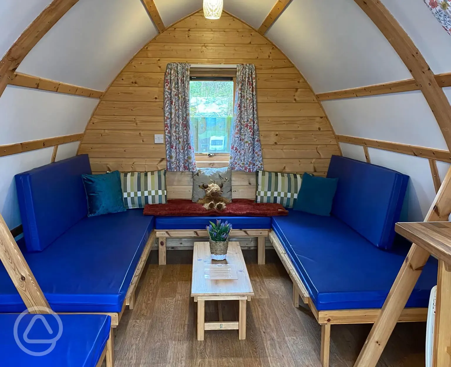Camping pod interior with sofas