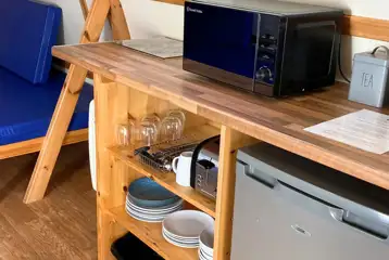 Camping pod with a fridge, microwave, kettle, toaster, cutlery and crockery Camping pod with a fridge, microwave, kettle, toaster, cutlery and crockery