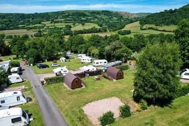 Aerial of the pitches and glamping pods at Cwmdu Campsite