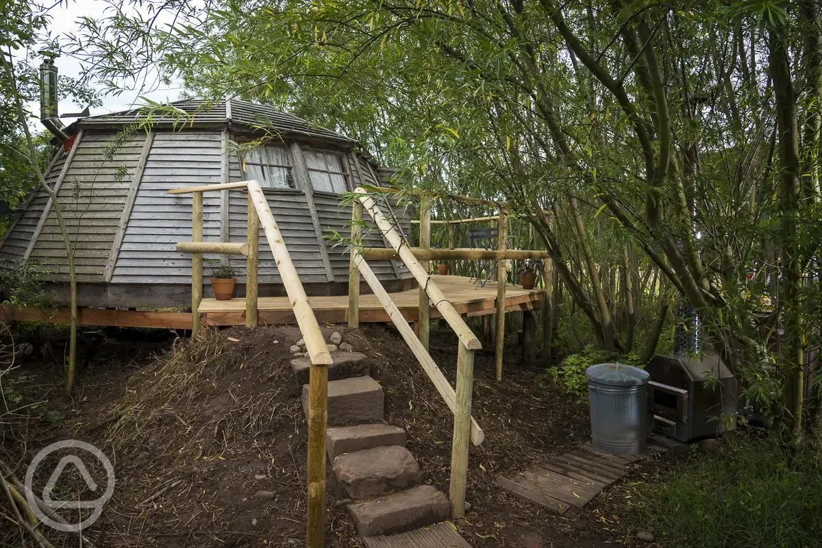 Wooden cabin with step access