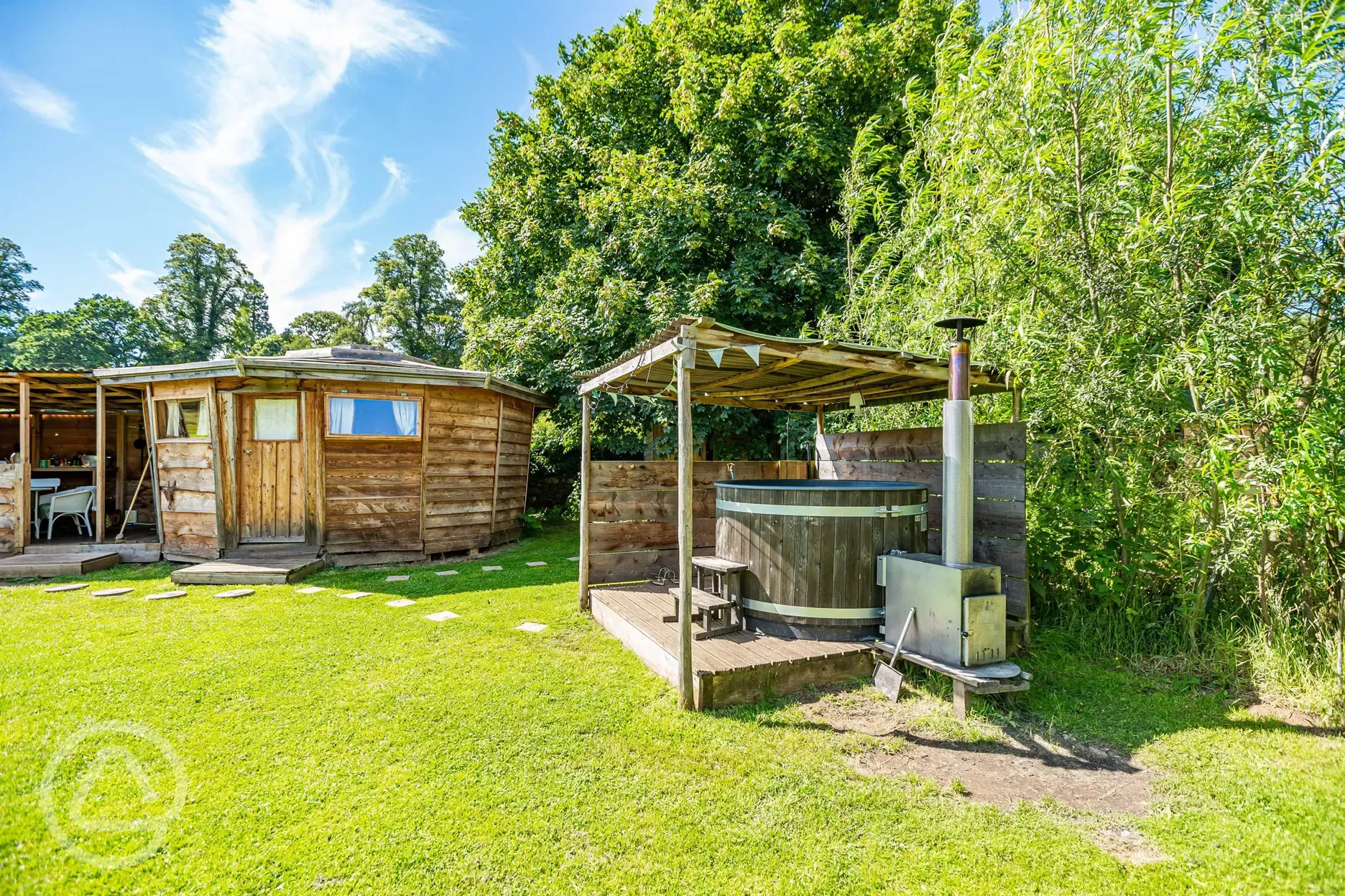 Wooden cabin with a private, sheltered wood-fired hot tub