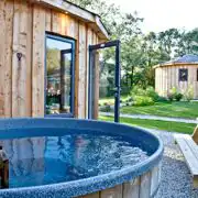 Roundhouses with wood-fired hot tubs