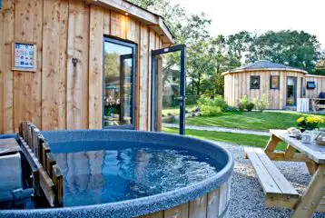 Roundhouses with wood-fired hot tubs Roundhouses with wood-fired hot tubs