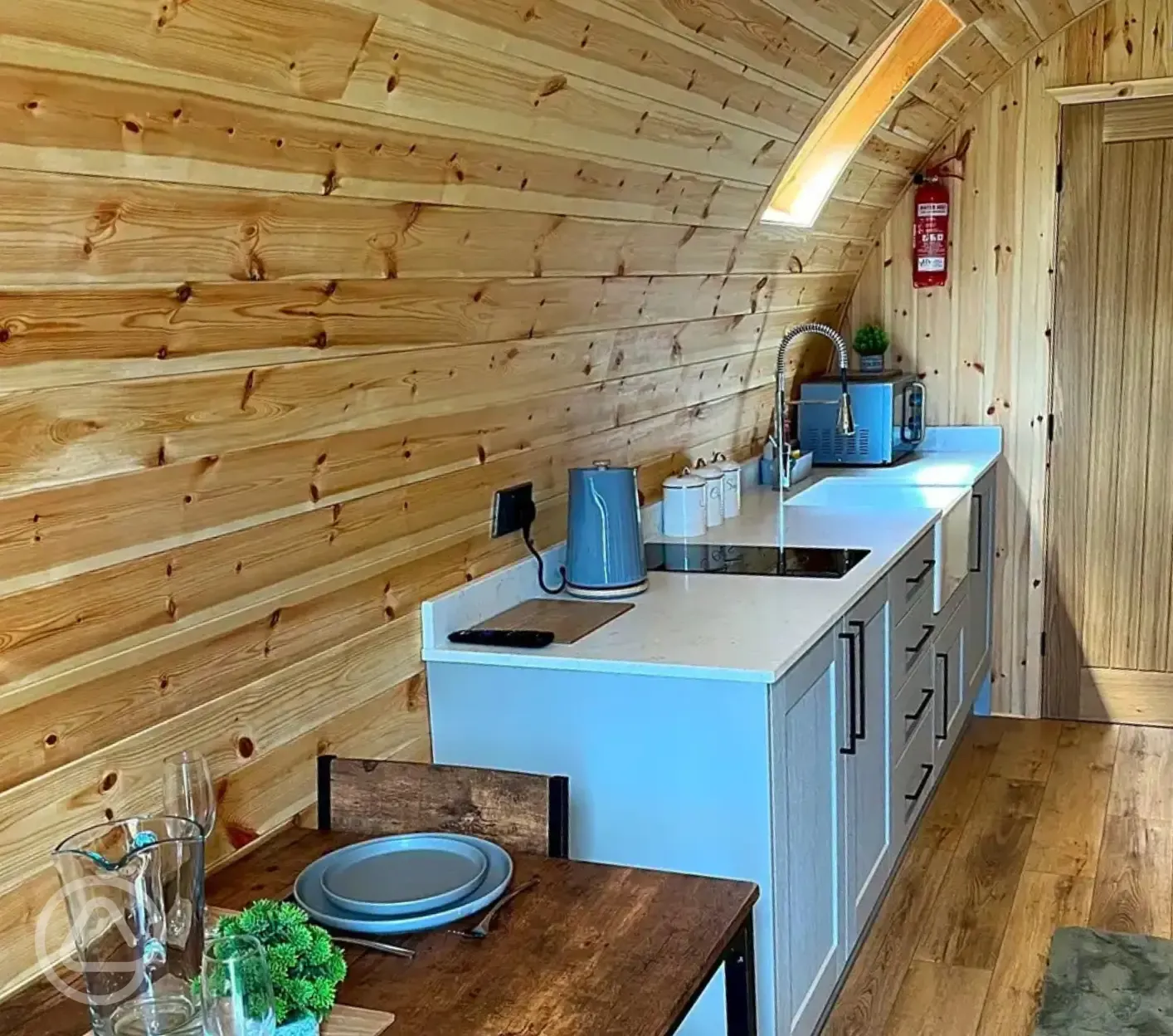 Pod kitchen with hob, kettle, toaster, microwave, air fryer, fridge and freezer