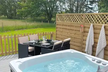 Private hot tub and seating area Private hot tub and seating area