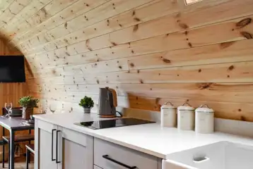 Pod kitchen with hob, kettle, toaster, microwave, air fryer, fridge and freezer Pod kitchen with hob, kettle, toaster, microwave, air fryer, fridge and freezer