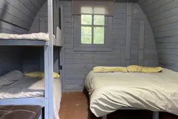 Double camping pod bedroom