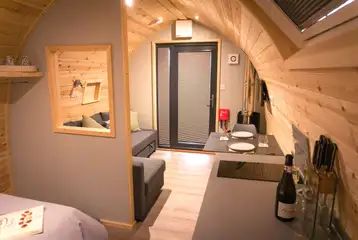 Castle pod with a double bed, large sofa, kitchen and ensuite bathroom Castle pod with a double bed, large sofa, kitchen and ensuite bathroom