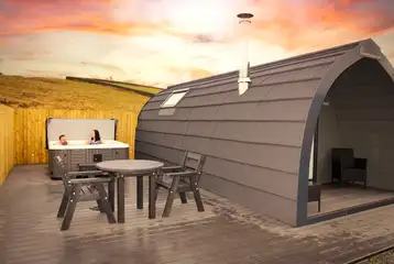 Castle glamping pods with a large outdoor deck and hot tub Castle glamping pods with a large outdoor deck and hot tub