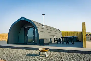 Castle glamping pod with a private hot tub and patio Castle glamping pod with a private hot tub and patio