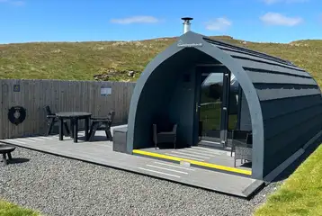Castle glamping pods with a large outdoor deck and hot tub Castle glamping pods with a large outdoor deck and hot tub