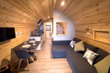 Castle pod with a double bed, large sofa, kitchen and ensuite bathroom Castle pod with a double bed, large sofa, kitchen and ensuite bathroom
