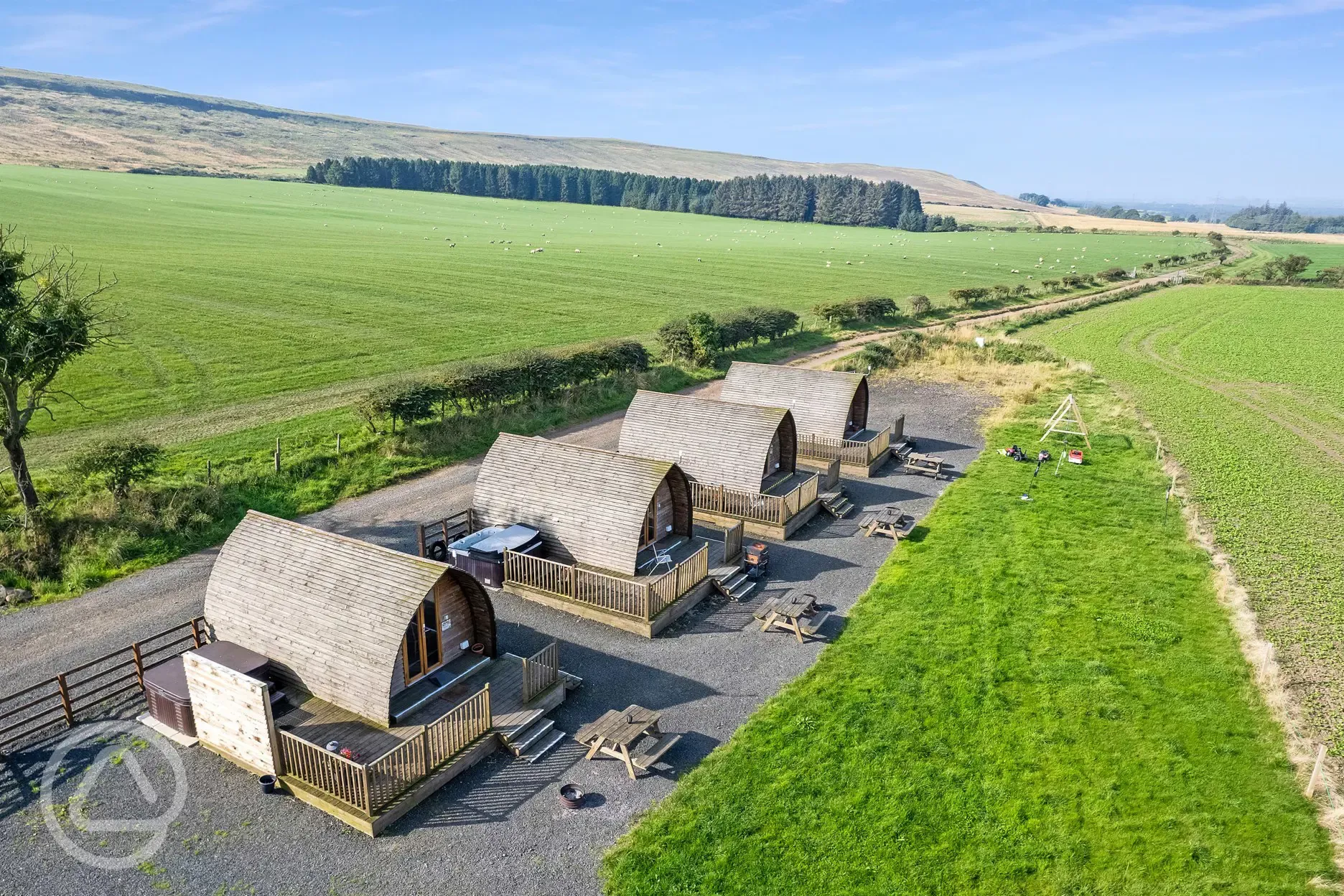 Deluxe Wigwam pods with hot tubs