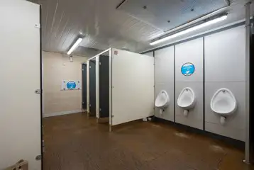 Toilets with cubicles and urinals Toilets with cubicles and urinals