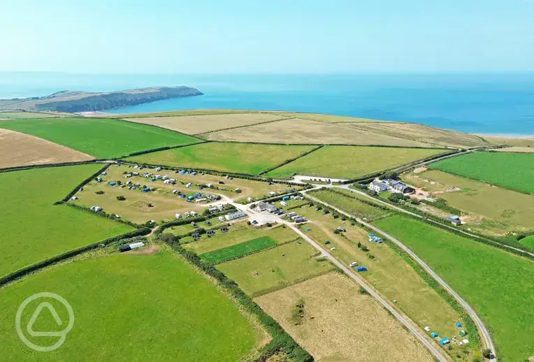 Aerial of Little Roadway Farm Camping Park and the coast
