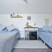 Large pods with a double bed, and a single trundle bed that turns into a king Large pods with a double bed, and a single trundle bed that turns into a king