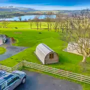 Aerial of the camping pods overlooking Llangorse Lake