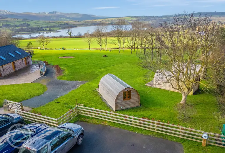 Aerial of the camping pods overlooking Llangorse Lake