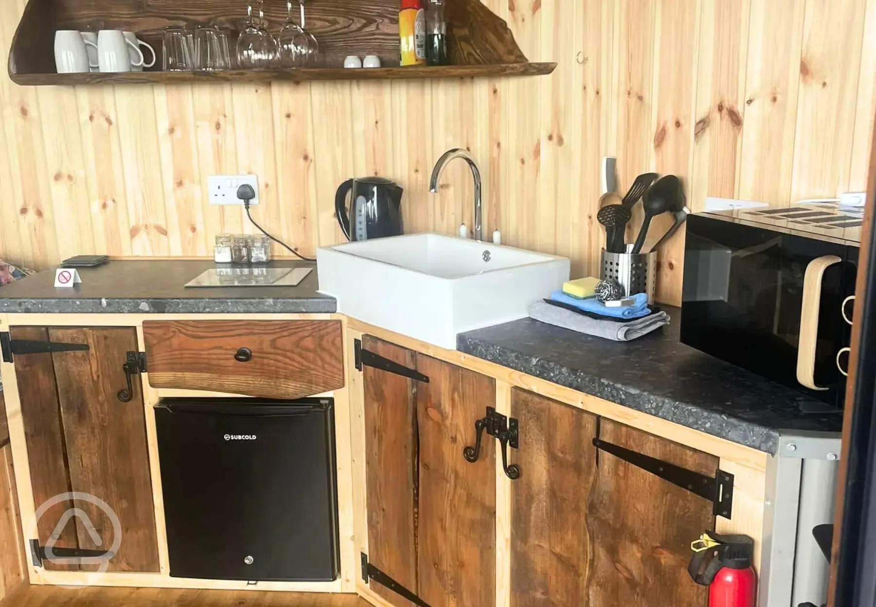Ape Dale View cabin with a sink, fridge and electric hob
