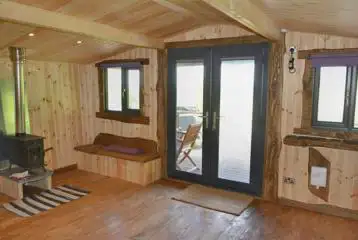 Caradoc Lodge with a wood burner