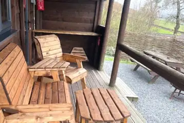 View from the Caradoc Lodge with outdoor seating and a patio