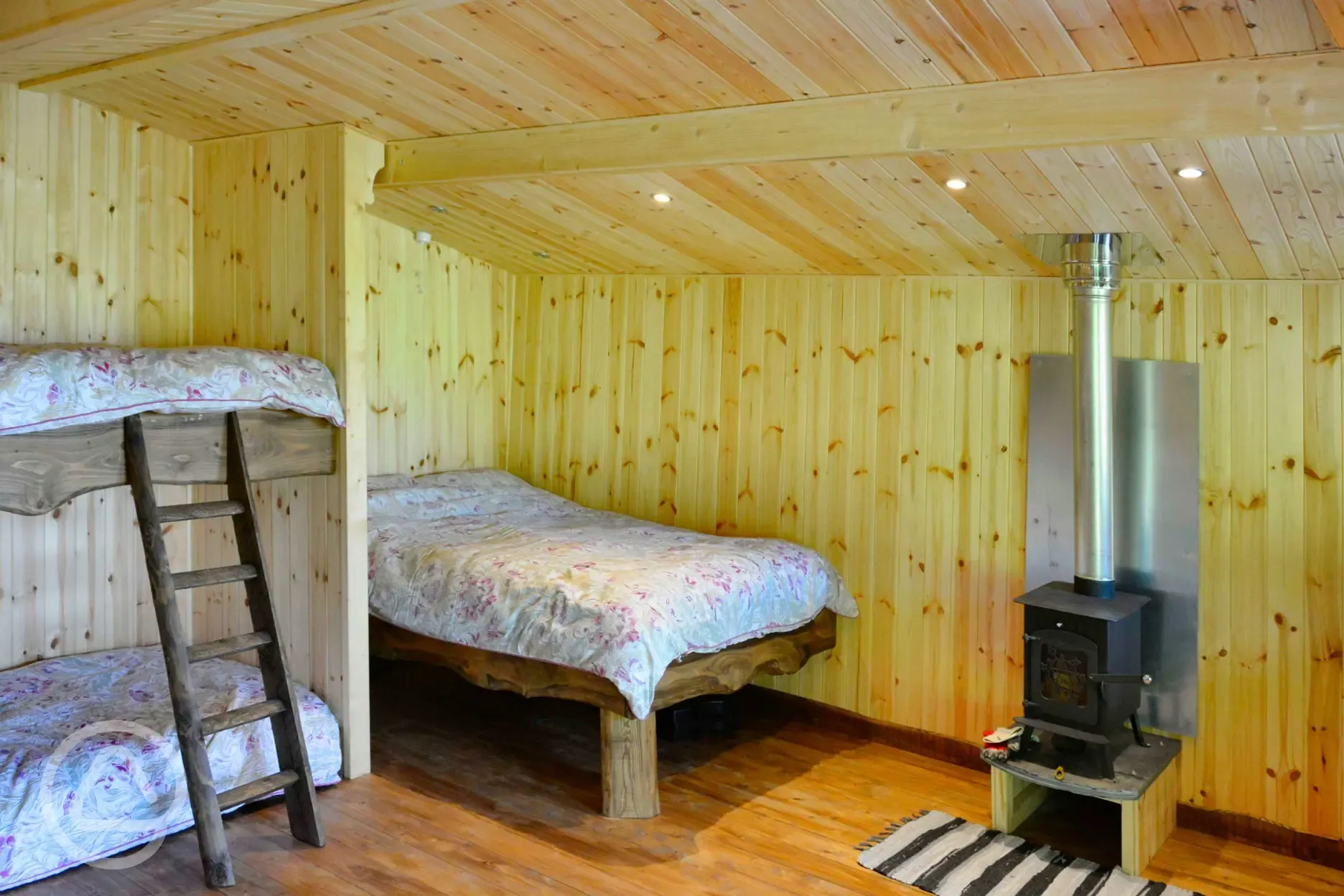 Caradoc Lodge with a double bed and bunk bed