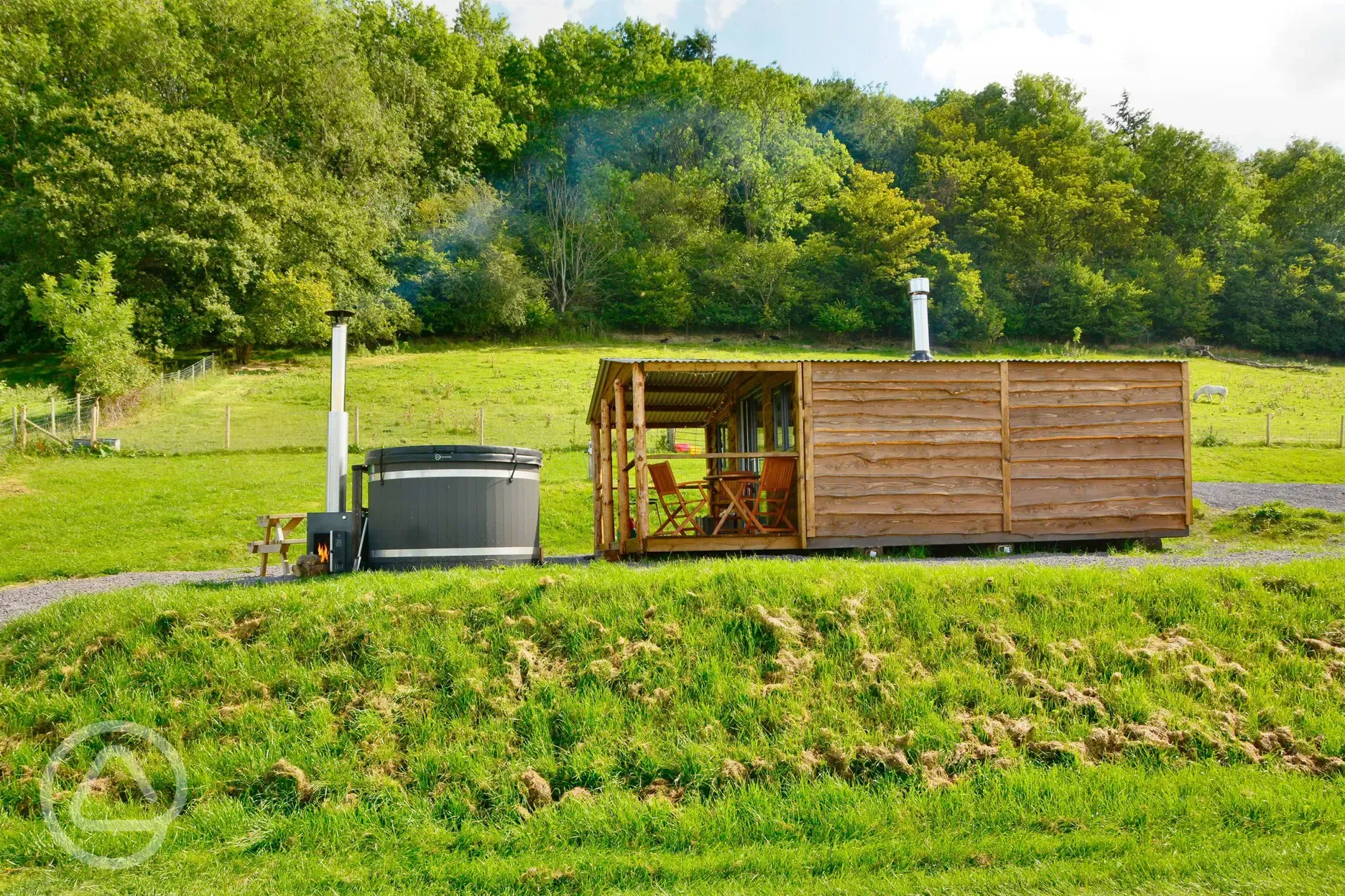 Caradoc Lodge with a wood-fired hot tub