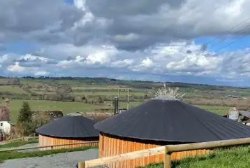 Roundhouses with countryside views