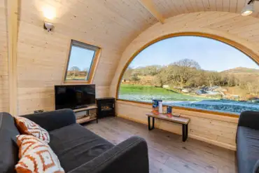 Parkgate cabin living area with tv and countryside views