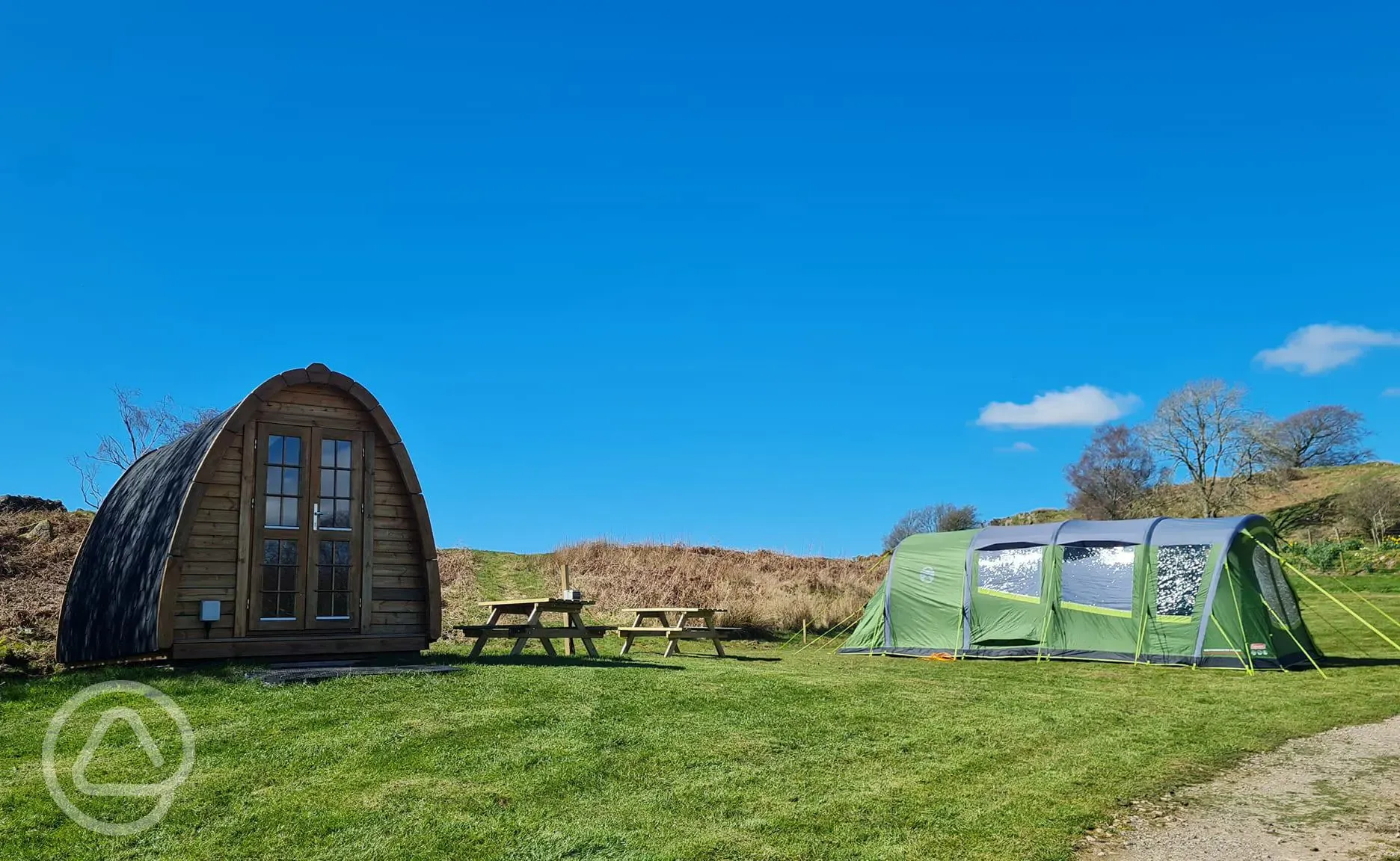 Camping pod and grass pitches