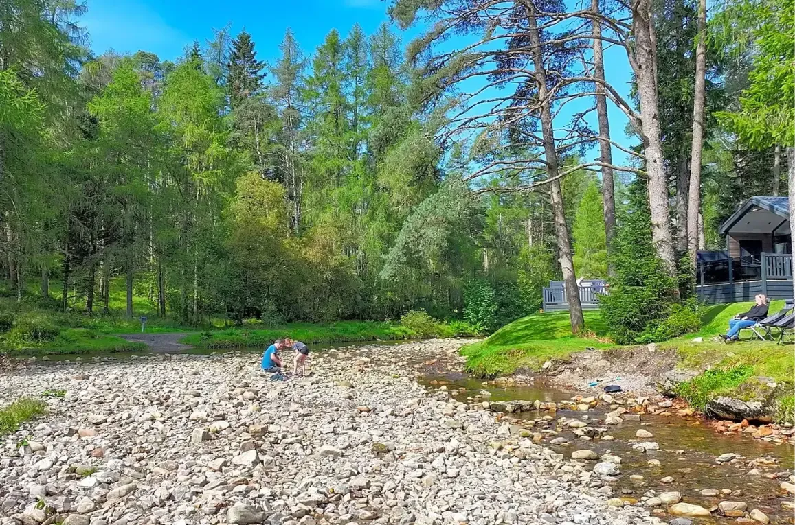 By the river