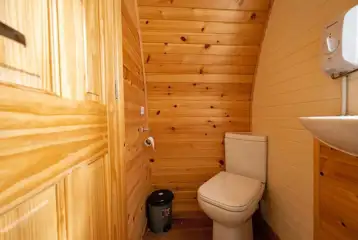 Hiker pod ensuites with shower, toilet and sink Hiker pod ensuites with shower, toilet and sink