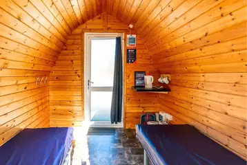 Small hiker pod interior with kettle and mugs Small hiker pod interior with kettle and mugs