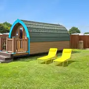 Camping pod with a picnic bench Camping pod with a picnic bench