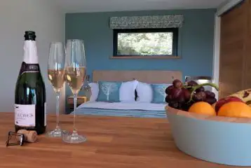 Graze Garth ensuite glamping lodge bed