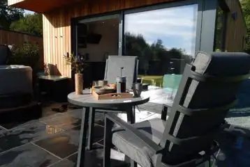 Outdoor dining area of glamping lodge
