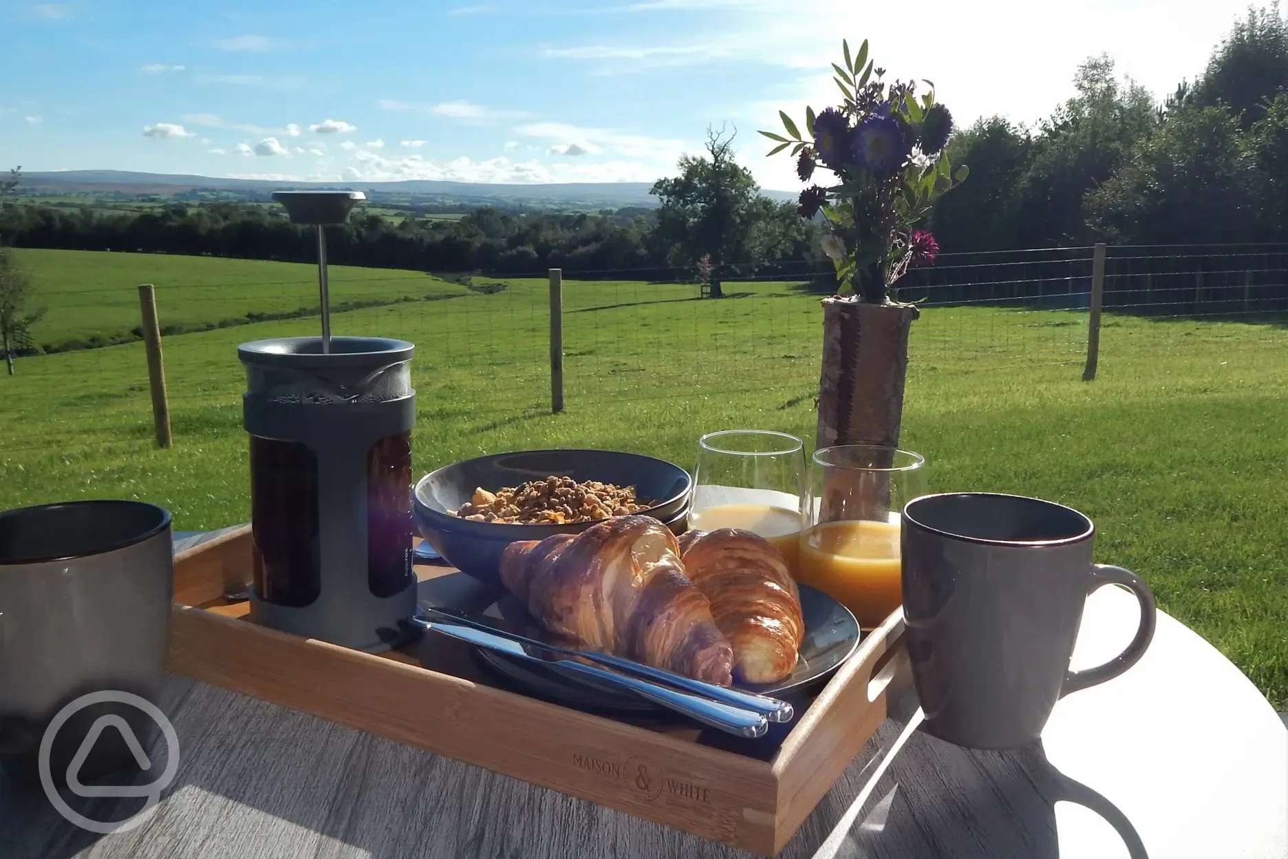 Outdoor dining area of the glamping lodges