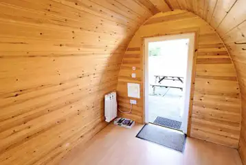 Camping pod interior with two double sockets, sorry no dogs allowed