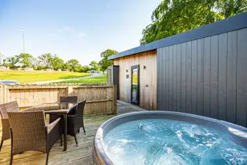 Curlew lodge with a private decking area and electric hot tub Curlew lodge with a private decking area and electric hot tub